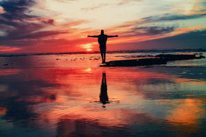 Man facing sunset
